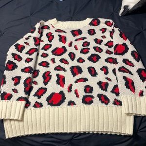 Red and black cheetah print sweater size small barely worn